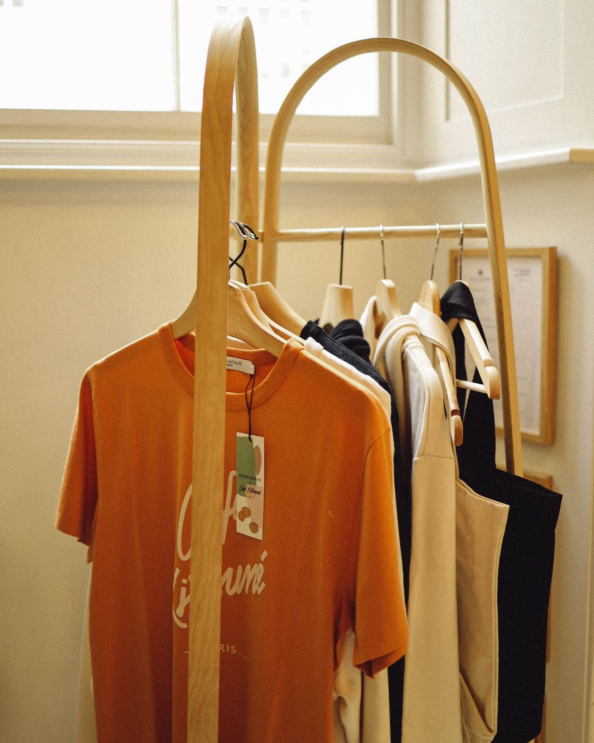 Ready-made fashion garments displayed on a clothing rack